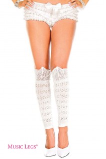 Music leg: gambali in tessuto bianco lavorato. Music leg: gambali in tessuto bianco lavorato.