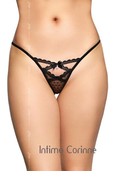 Tanga nero in pizzo a pois con fiocchi e pendenti. Tanga nero in pizzo a pois con fiocchi e pendenti.
