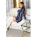 Miniabito in maglia a righe con collo alto blu navy