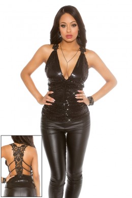 Top nero ricoperto di paillettes con ricamo sulla schiena. Top nero ricoperto di paillettes con ricamo sulla schiena.