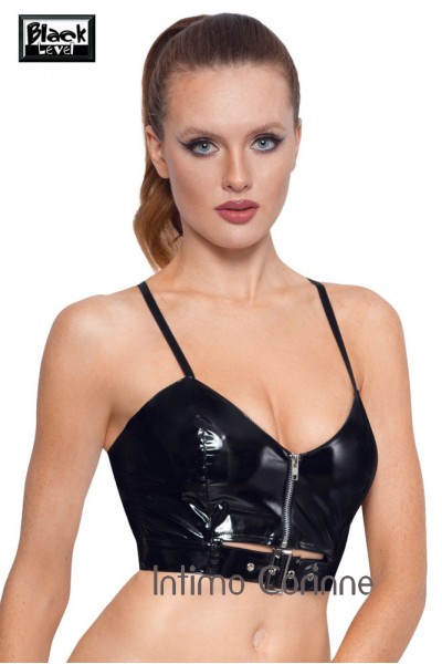 Top in vinile con zip e fibbia. Top in vinile con zip e fibbia.