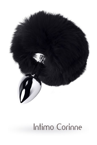 Plug in metallo argentato con peluche nero. Plug in metallo argentato con peluche nero.