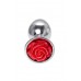 Plug in metallo con rosa rossa. Plug in metallo con rosa rossa.