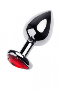 Plug in metallo con cristallo rosso. Plug in metallo con cristallo rosso.