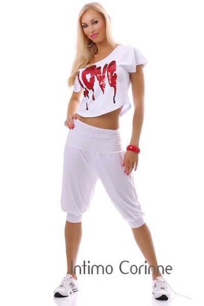 Pantaloni al ginocchio cavallo basso. Bianco. Pantaloni al ginocchio cavallo basso. Bianco.