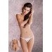 Passion: micro tanga in pizzo con fiocchetto posteriore. Bianco Passion: micro tanga in pizzo con fiocchetto posteriore. Bianco